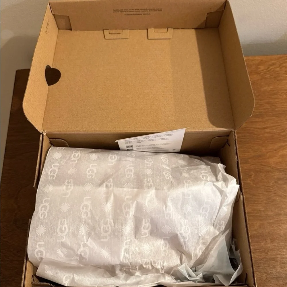 Brand new in box! UGG Kids Tan Slip-On Shoes